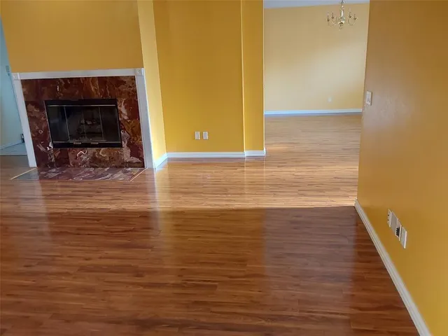 a view of a livingroom with wooden floor