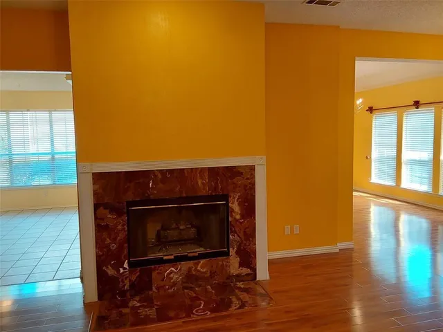 a living room with a fireplace