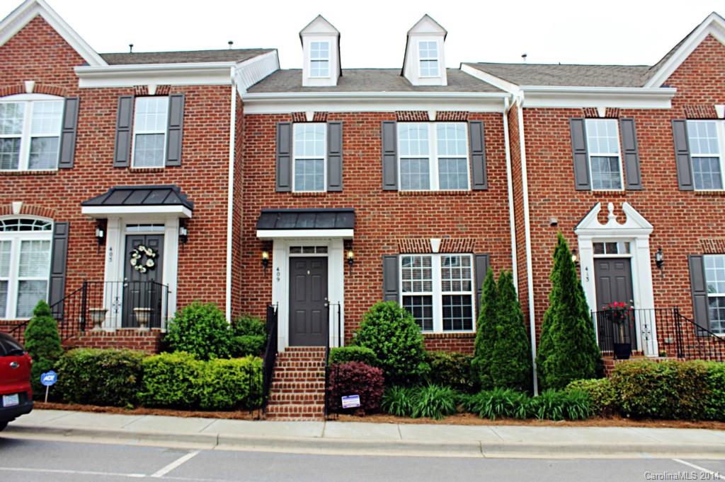 409 Armour Street Davidson, NC 28036 - Photo 1 of 24 a front view of a multi story residential apartment building