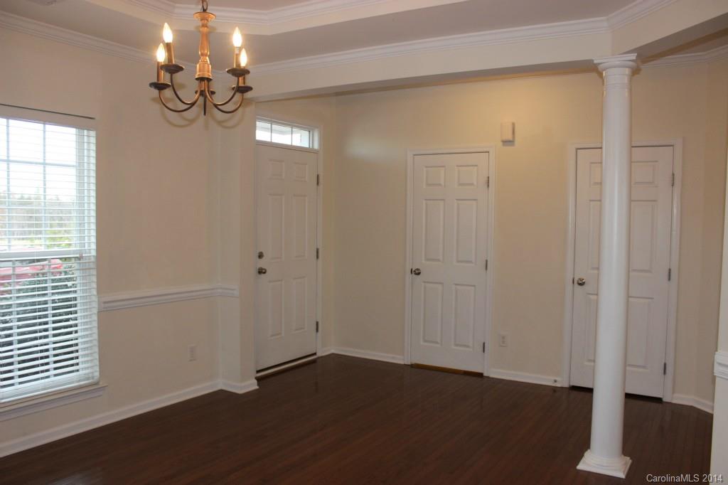 409 Armour Street Davidson, NC 28036 - Photo 2 of 24 wooden floor in an empty room with a window