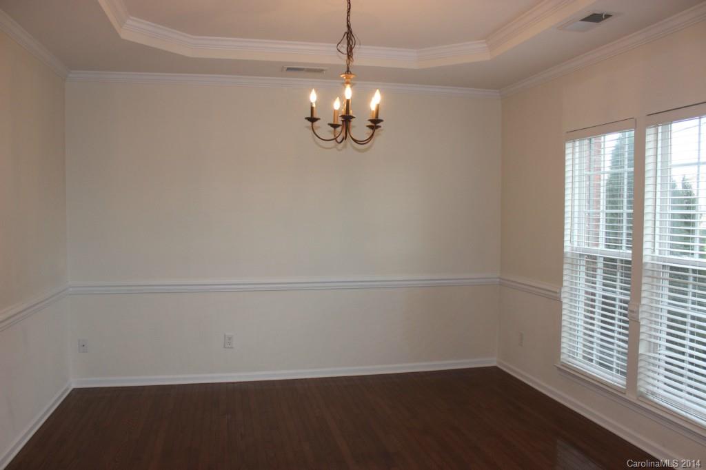 409 Armour Street Davidson, NC 28036 - Photo 3 of 24 a view of an empty room with a window