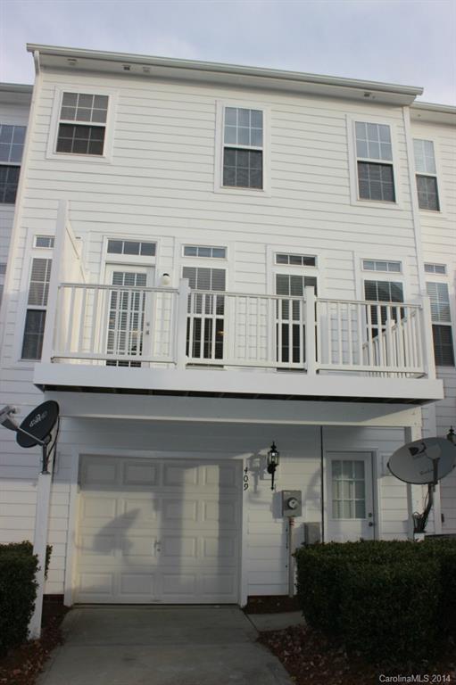 409 Armour Street Davidson, NC 28036 - Photo 23 of 24 a front view of a house with a yard