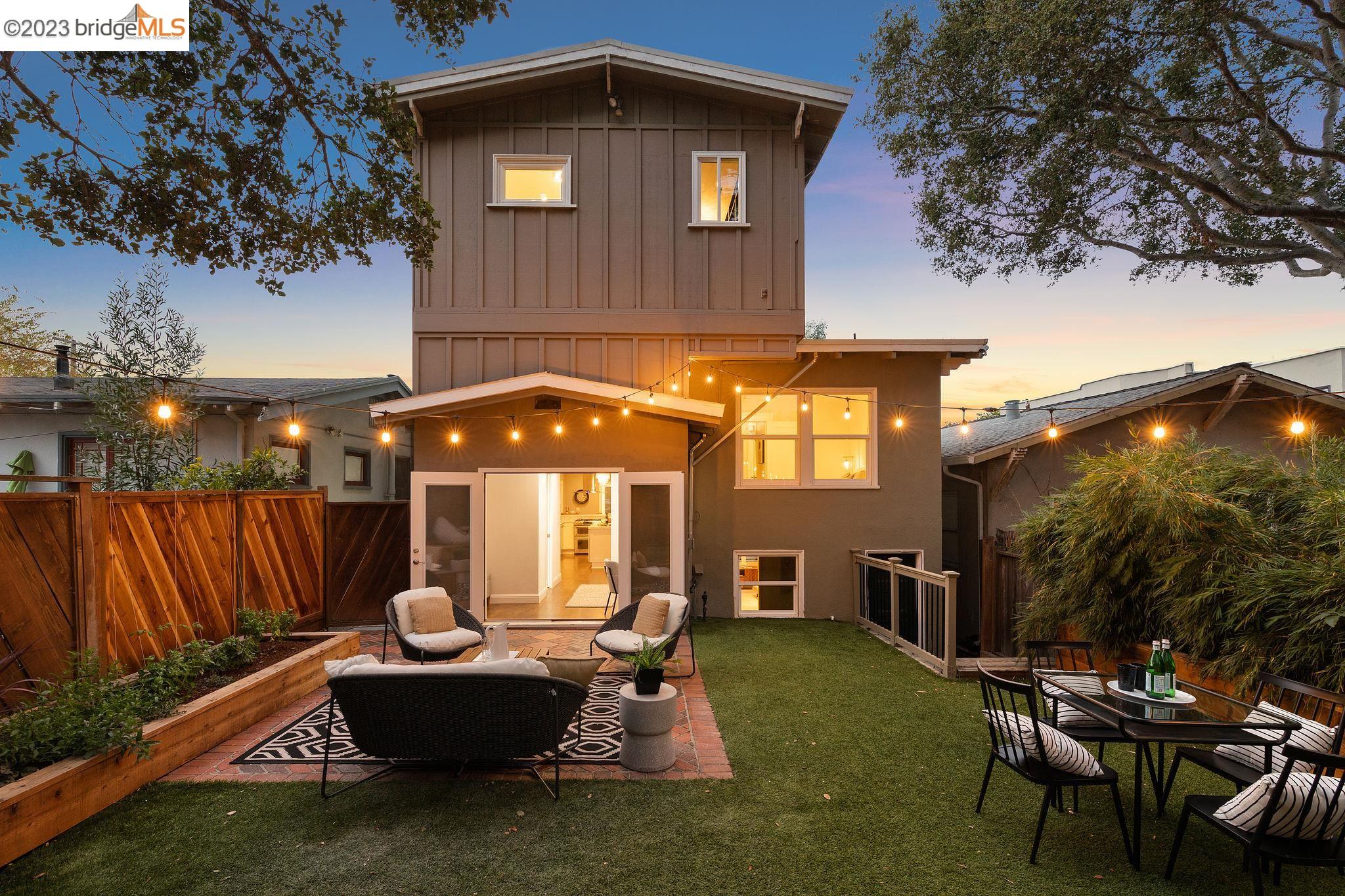 a front view of house with yard outdoor seating and entertaining space