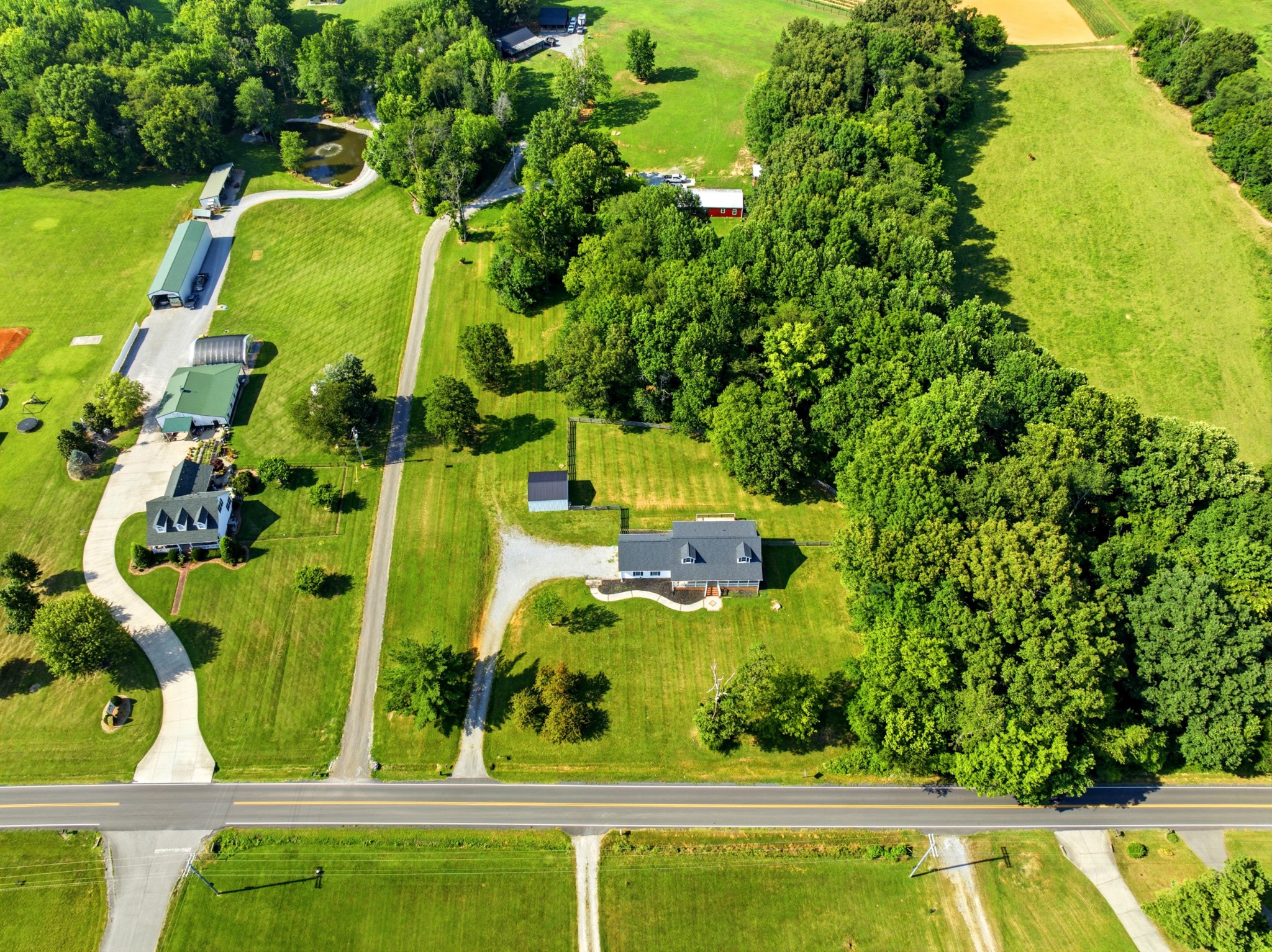 3434 Kinneys Road Cedar Hill, TN 37032 - Photo 62 of 90 an aerial view of a residential houses with yard