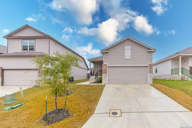 a front view of house with yard