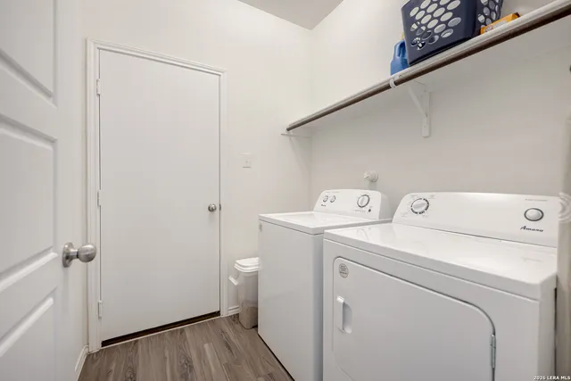 a utility room with dryer and washer