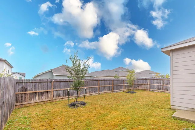 a view of a swimming pool with a lounge chairs
