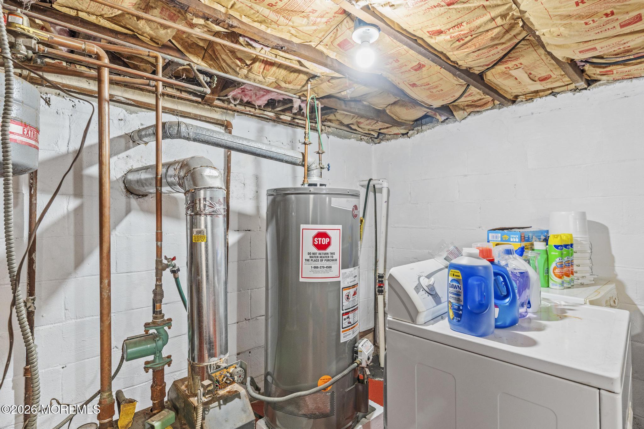 1914 Rutherford Avenue Neptune Township, NJ 07753 - Photo 16 of 25 a utility room with dryer and washer