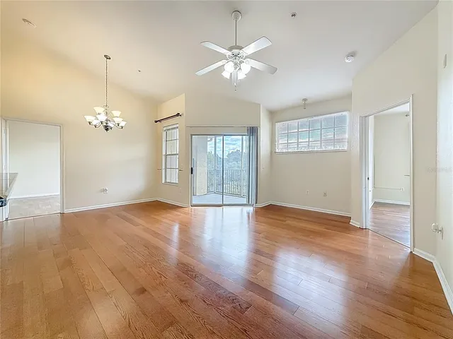 a kitchen with a refrigerator and a sink