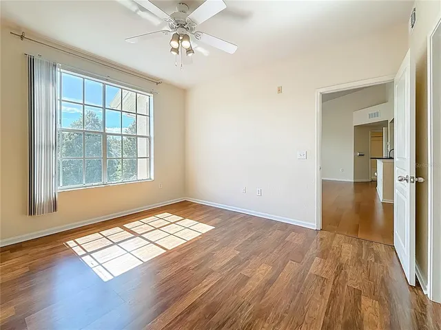 a view of a small space with wooden floor