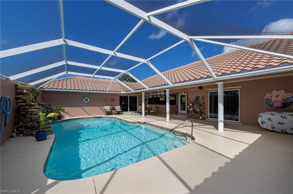 13541 Stringfellow Road Bokeelia, FL 33922 - Photo 30 of 49 a view of a house with porch