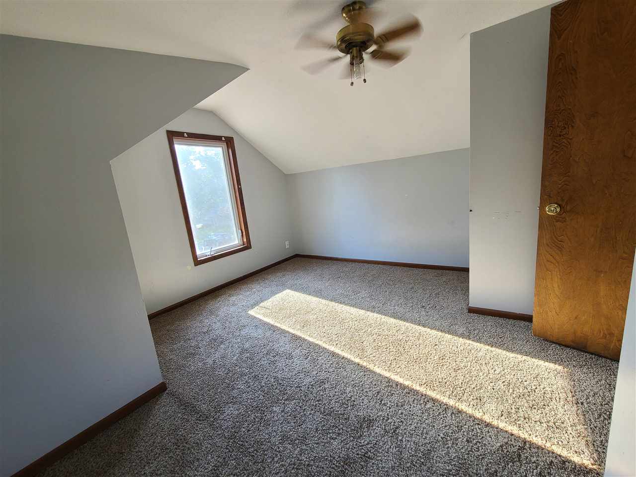 528 North 12th Street Rochelle, IL 61068 - Photo 8 of 16 an empty room with windows and entrance