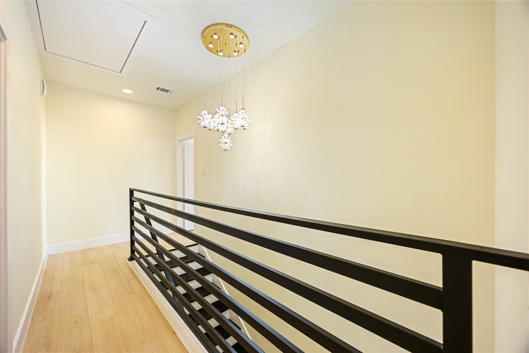 7125 England Street Houston, TX 77021 - Photo 12 of 28 a view of a room with wooden floor and staircase
