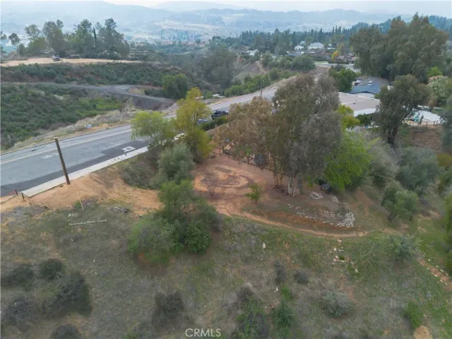 a view of a yard with a lake view