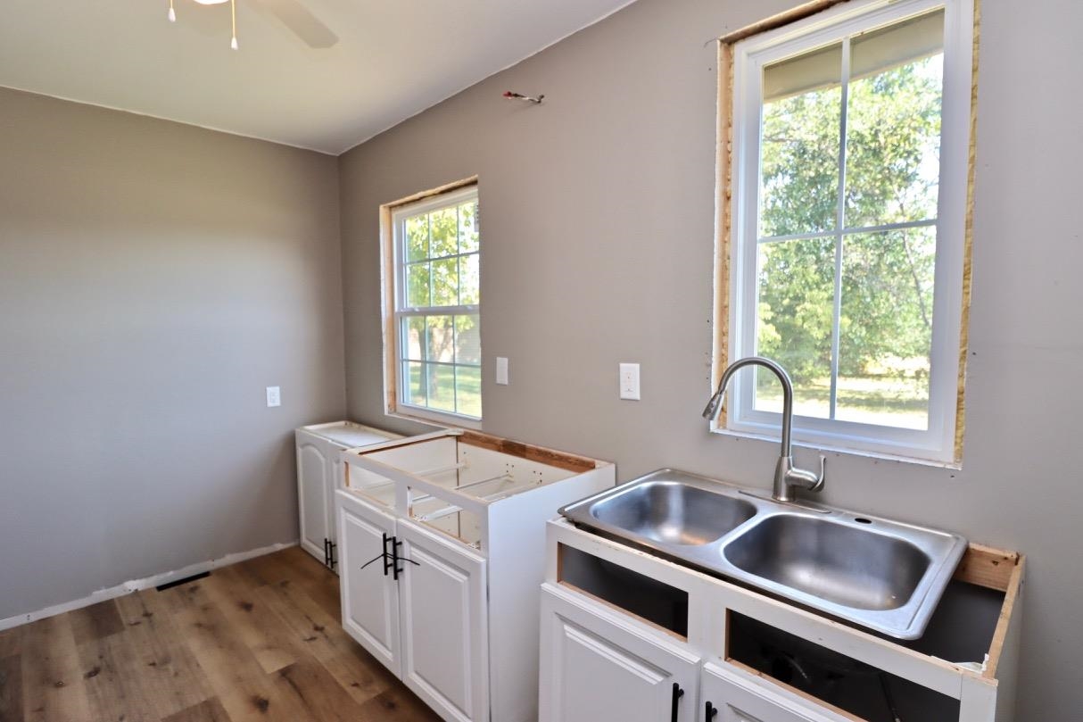 2228 Magnolia Rockford, IL 61104 - Photo 5 of 8 a kitchen that has a sink and a window