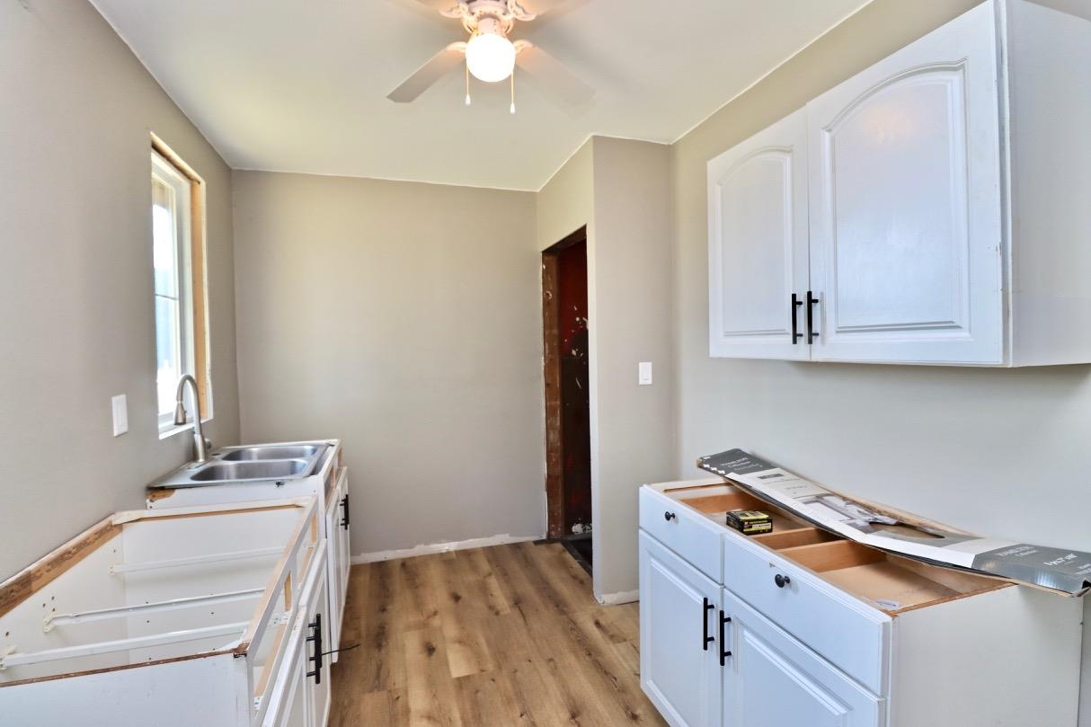 2228 Magnolia Rockford, IL 61104 - Photo 6 of 8 a room with storage and utility