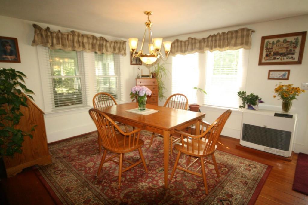 37 Back Narrows Road Boothbay, ME 04537 - Photo 6 of 20 The dining room, with stone hearth...
