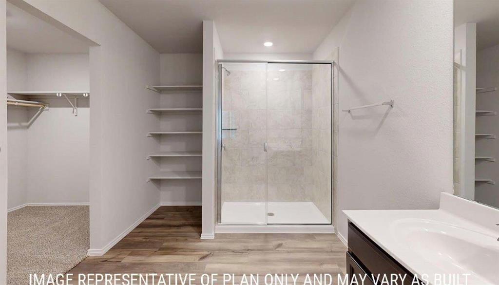 10225 Altair Drive Waco, TX 76708 - Photo 11 of 13 a bathroom with a shower