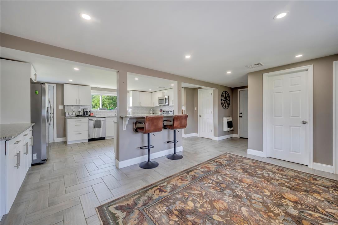 439 Cherry Hill Road Nazareth, PA 18064 - Photo 31 of 31 An inviting open floorplan connects the well-appointed kitchen to a versatile living space.