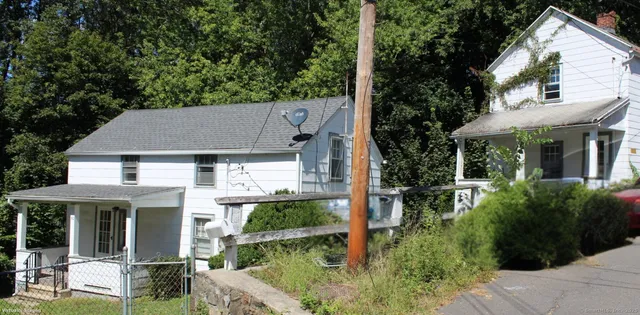front view of house with a yard