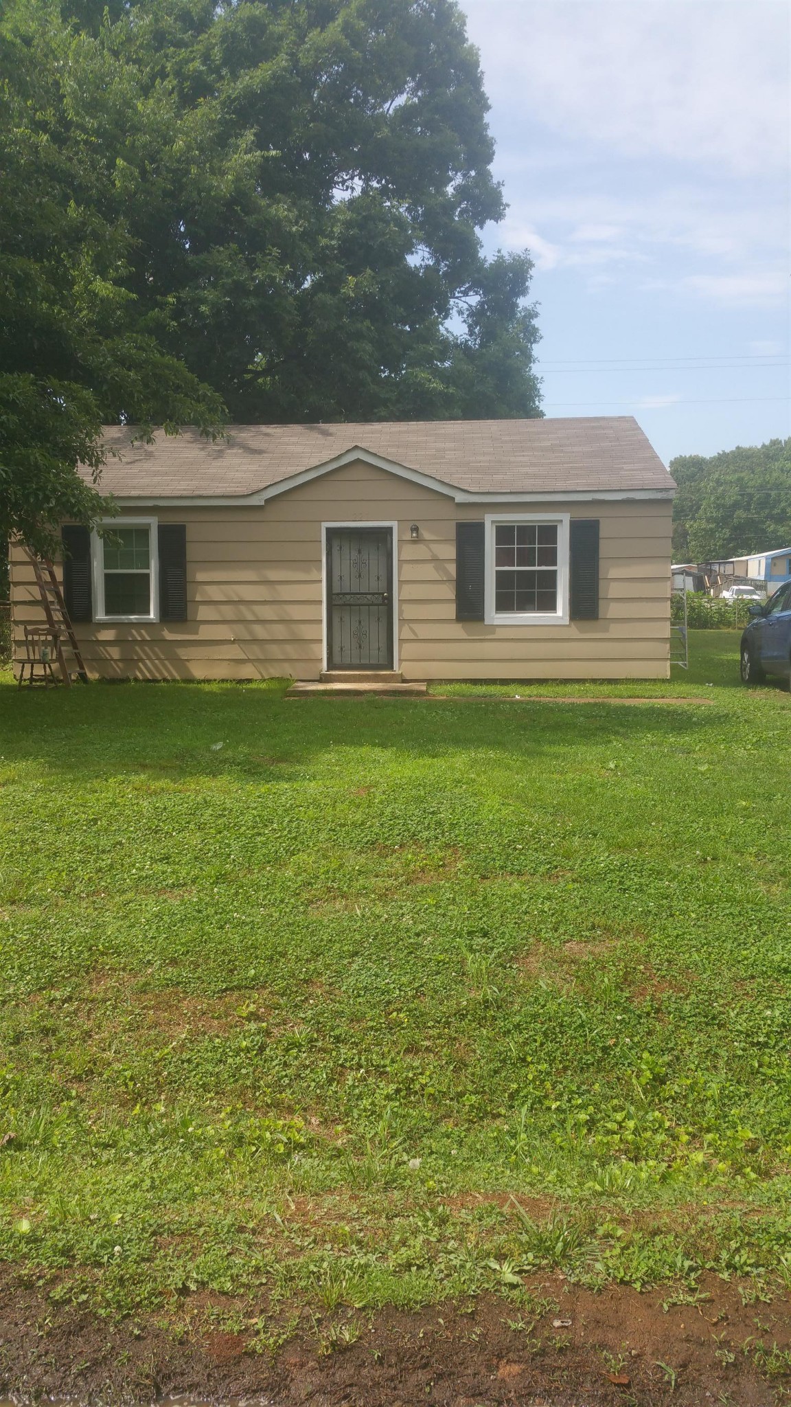 227 Burch Road Clarksville, TN 37042 - Photo 1 of 1 a backyard of a house with seating space