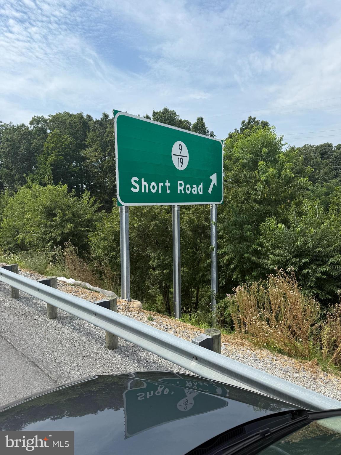 83 ID Van Metre Road Kearneysville, WV 25430 - Photo 11 of 11 a view of a sign board with a street view
