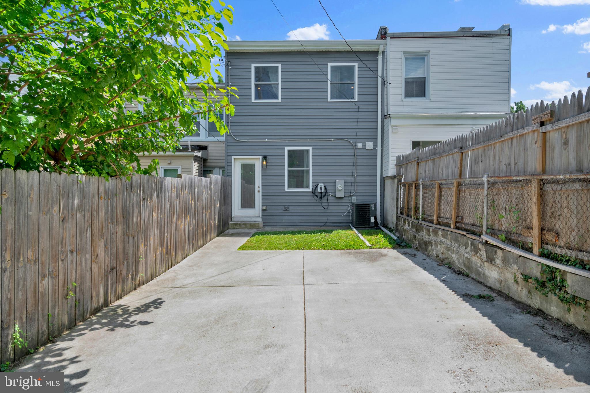 624 West 33rd Street Baltimore, MD 21211 - Photo 32 of 36 Rear Yard with Level 2 Car Charger