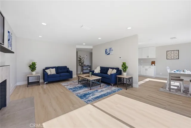 a living room with furniture and a table