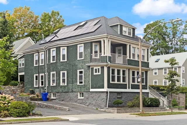 a front view of a building with street view
