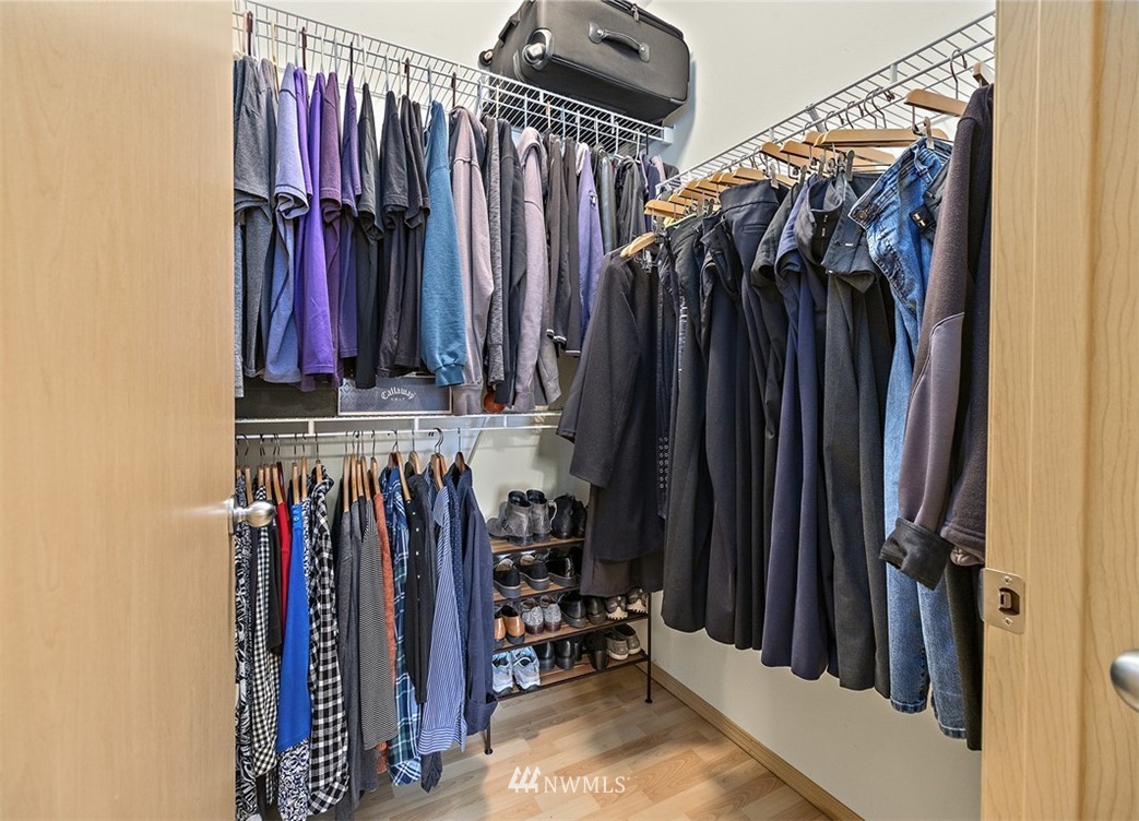 3012 Southeast 8th Place, Unit 1117 Renton, WA 98058 - Photo 19 of 40 a view of walk in closet with clothes