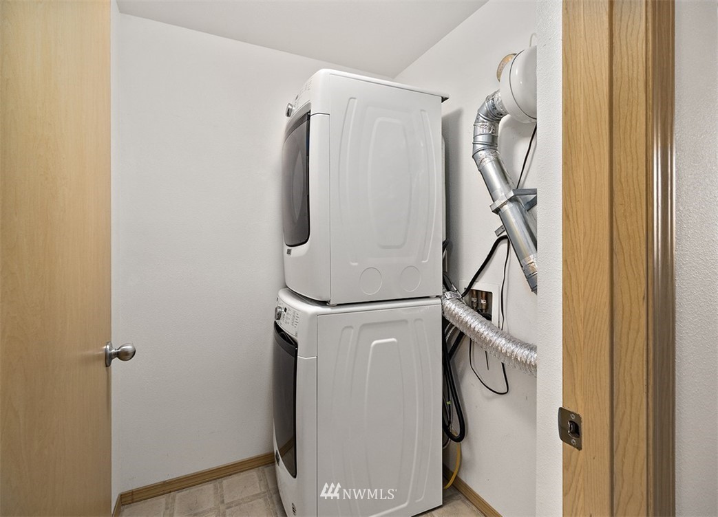 3012 Southeast 8th Place, Unit 1117 Renton, WA 98058 - Photo 24 of 40 a utility room with dryer and washer
