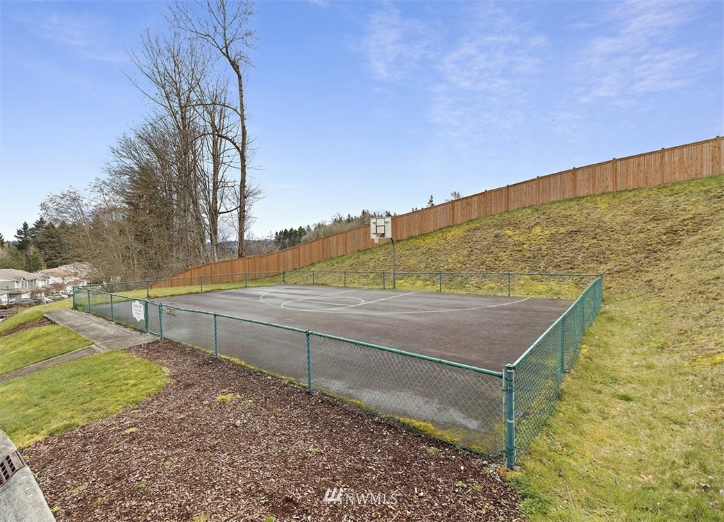 3012 Southeast 8th Place, Unit 1117 Renton, WA 98058 - Photo 39 of 40 a view of an outdoor space and a yard