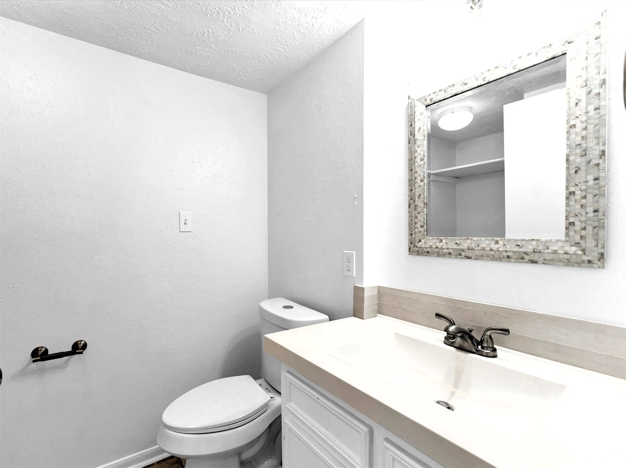 1101 Wilson Drive Rosenberg, TX 77471 - Photo 18 of 38 POWDER ROOM ON FIRST FLOOR, RECENT TOILET, SINK & MIRROR!