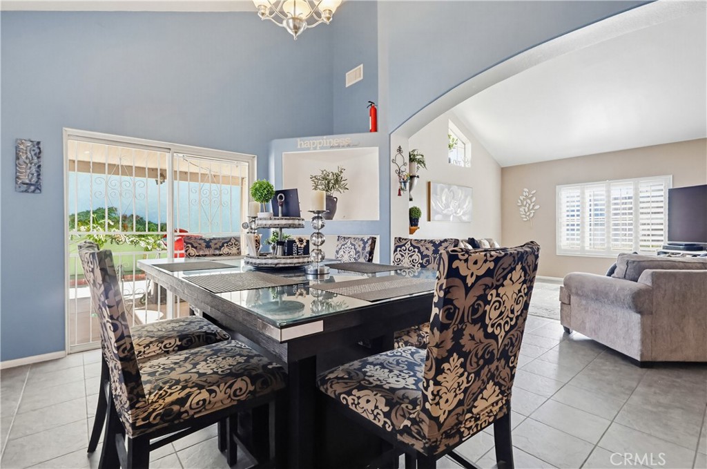 7735 Ridgeview Lane Whittier, CA 90606 - Photo 11 of 47 a view of a a dining room with furniture window and outside view