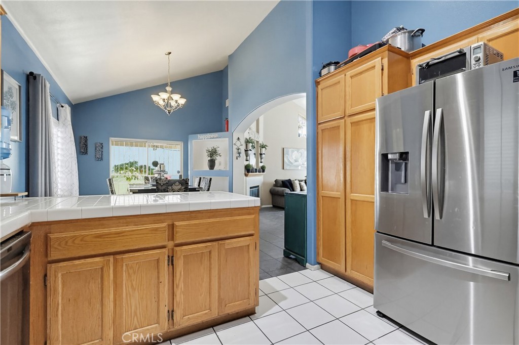 7735 Ridgeview Lane Whittier, CA 90606 - Photo 19 of 47 a kitchen with stainless steel appliances a refrigerator and a sink