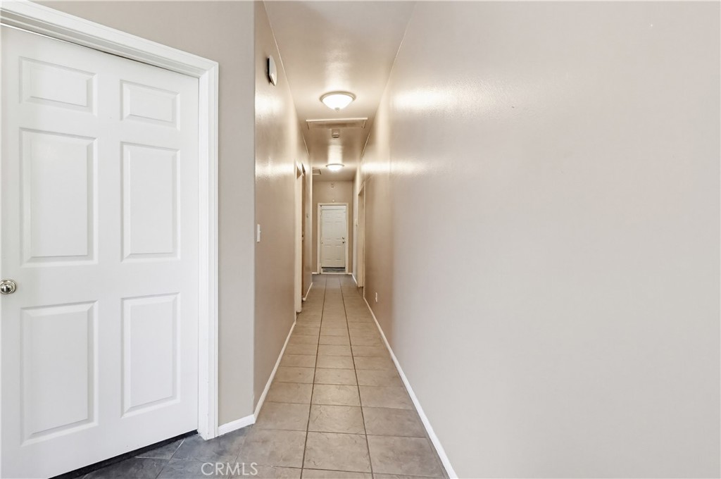 7735 Ridgeview Lane Whittier, CA 90606 - Photo 22 of 47 a view of a hallway with wooden floor