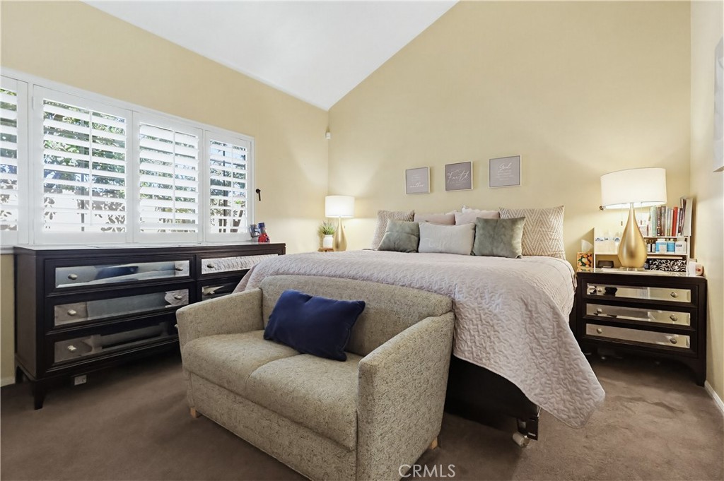 7735 Ridgeview Lane Whittier, CA 90606 - Photo 28 of 47 a bedroom with a bed and a window