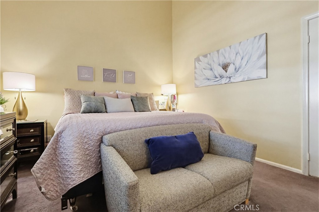 7735 Ridgeview Lane Whittier, CA 90606 - Photo 29 of 47 a bedroom with a bed and painting on the wall