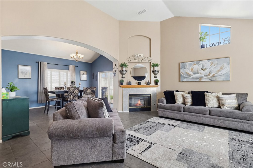 7735 Ridgeview Lane Whittier, CA 90606 - Photo 3 of 47 a living room with furniture fireplace and furniture