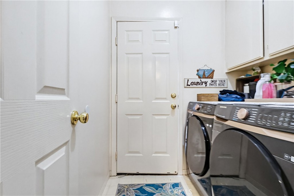 7735 Ridgeview Lane Whittier, CA 90606 - Photo 43 of 47 a utility room with dryer and washer