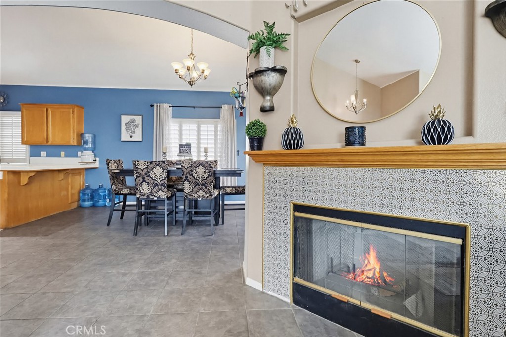 7735 Ridgeview Lane Whittier, CA 90606 - Photo 8 of 47 a living room with furniture and a fireplace