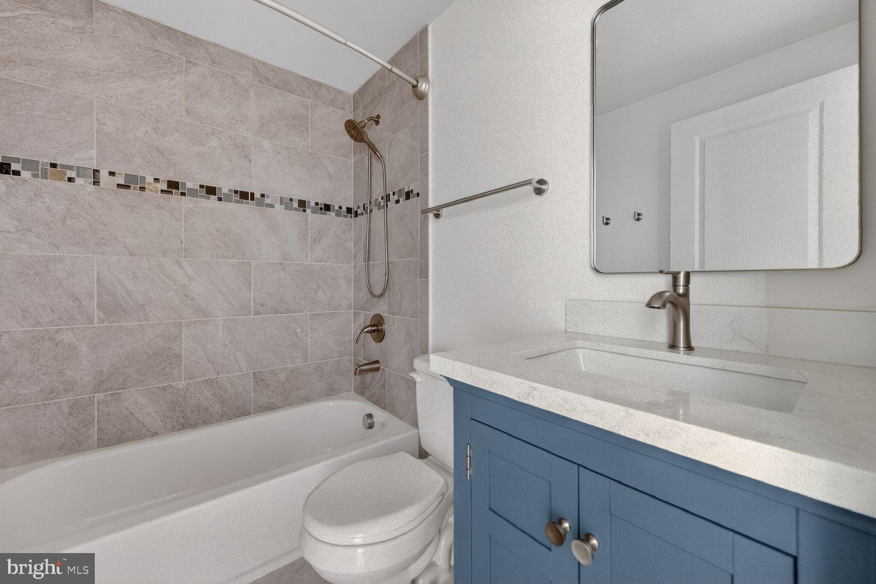 43983 Choptank Terrace Ashburn, VA 20147 - Photo 14 of 21 Modern bathroom with elegant finishes.