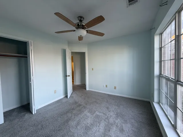 an empty room with windows