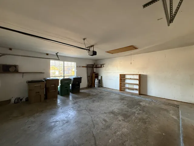 a view of a garage with furniture