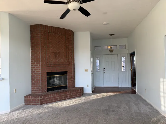 a living room with a fireplace