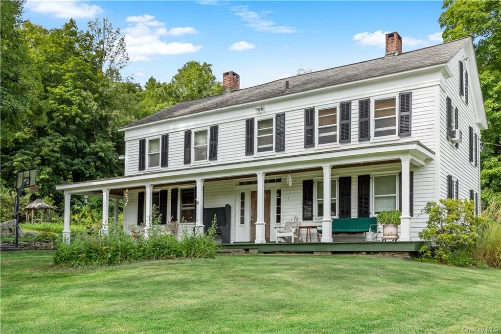 Incredible farmhouse colonial built circa 1835 sits in the countryside on over 6 acres in Putnam Valley just one mile from the Taconic State Parkway and one hour to NYC.