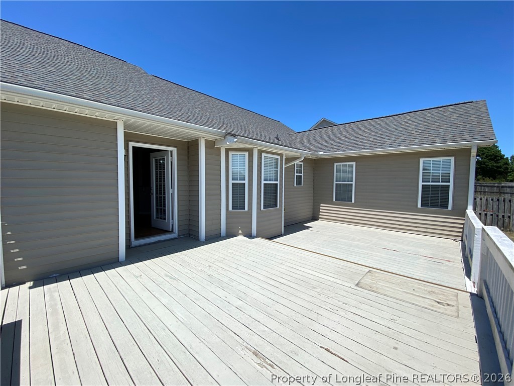 58 Polk Street Spring Lake, NC 28390 - Photo 25 of 26 a view of a house with a backyard