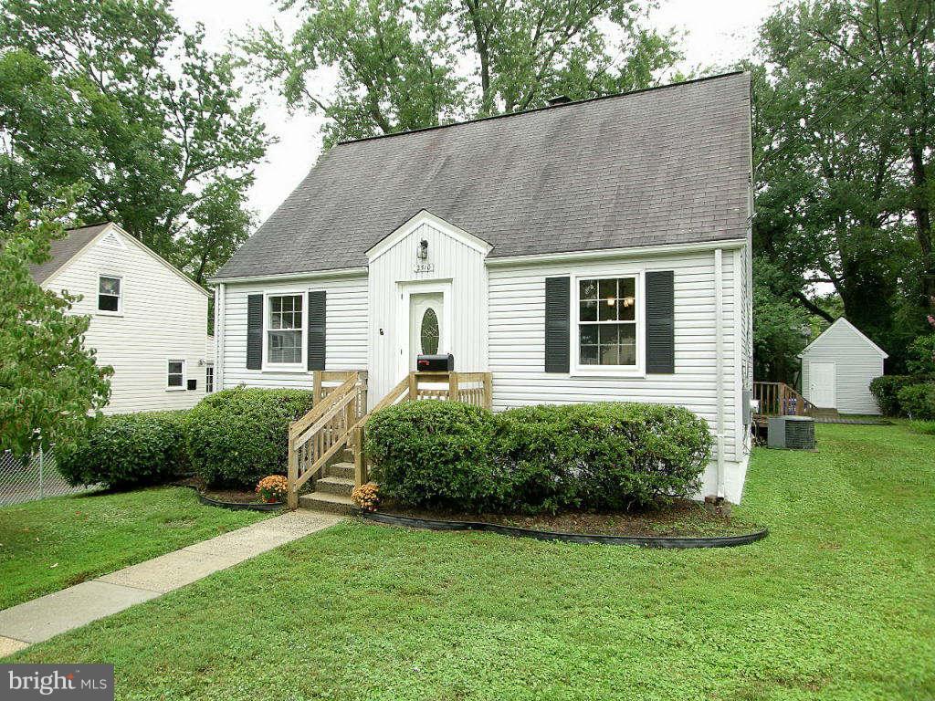 2510 Sheraton Street Silver Spring, MD 20906 - Photo 1 of 21 a front view of a house with a garden