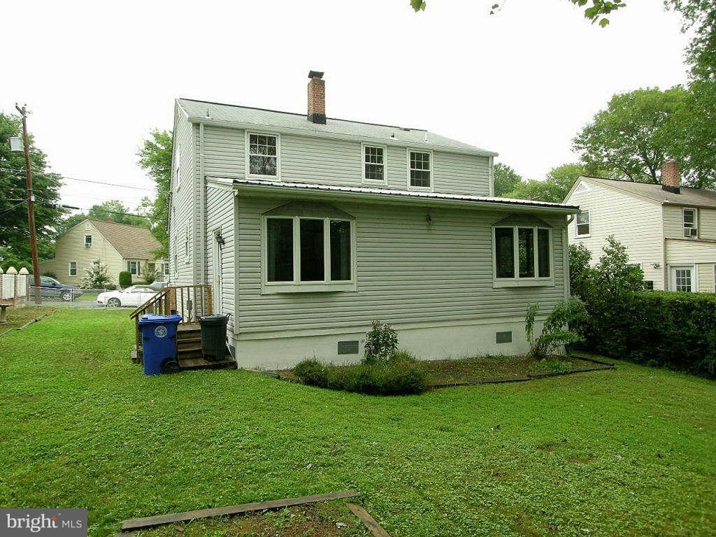 2510 Sheraton Street Silver Spring, MD 20906 - Photo 14 of 21 a front view of a house with a garden