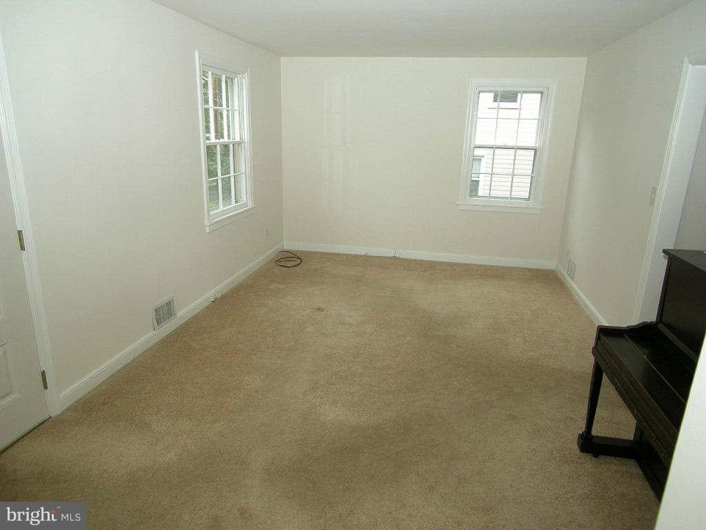 2510 Sheraton Street Silver Spring, MD 20906 - Photo 3 of 21 a view of an empty room with a window